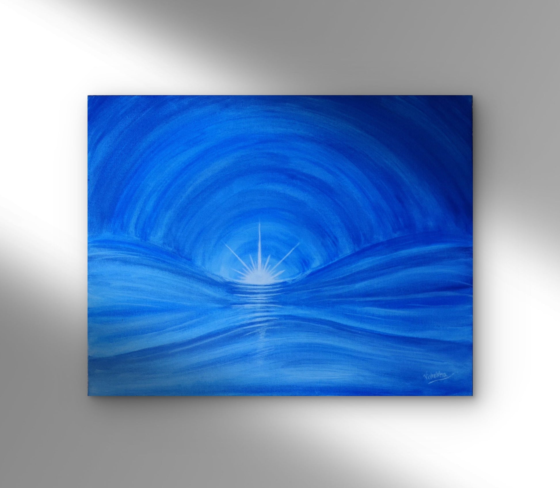 Abstract blue painting on a gray wall