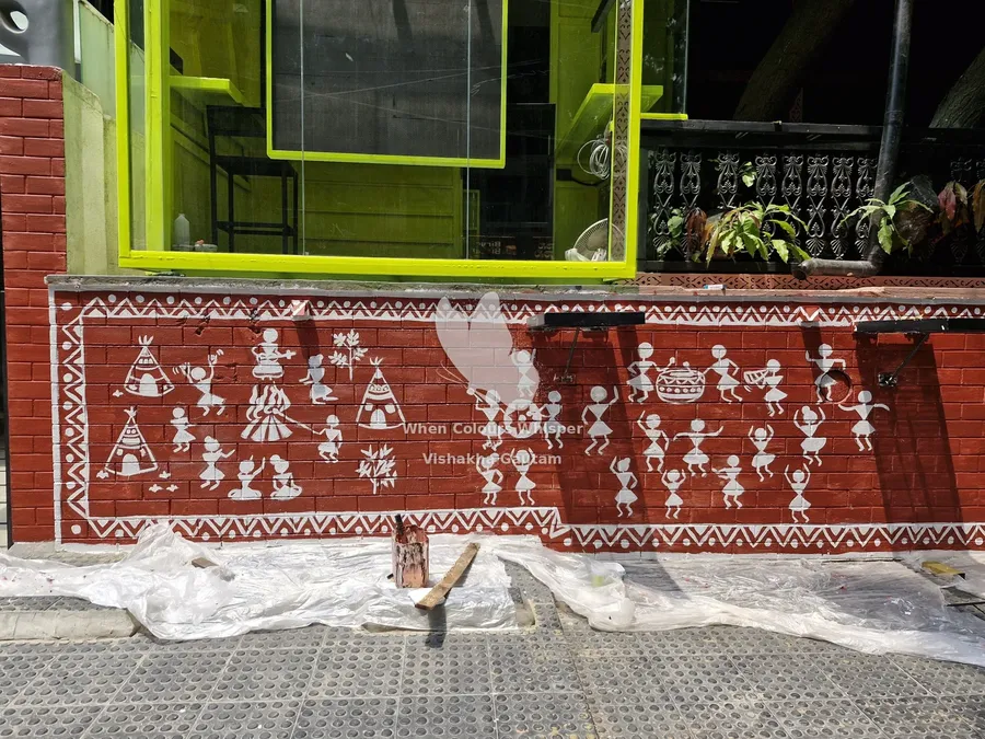 Warli mural on a café wall