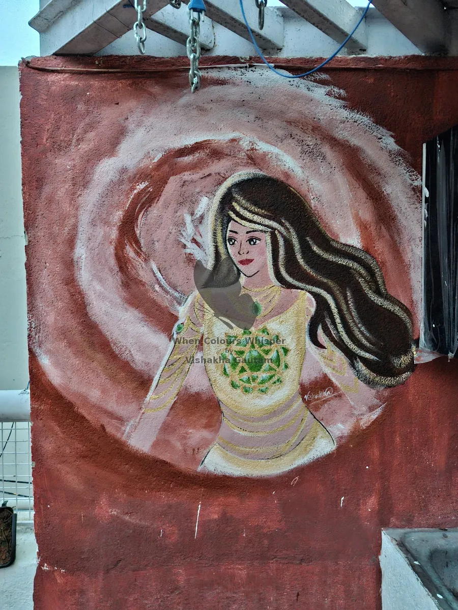 Mural of a woman with a heart chakra